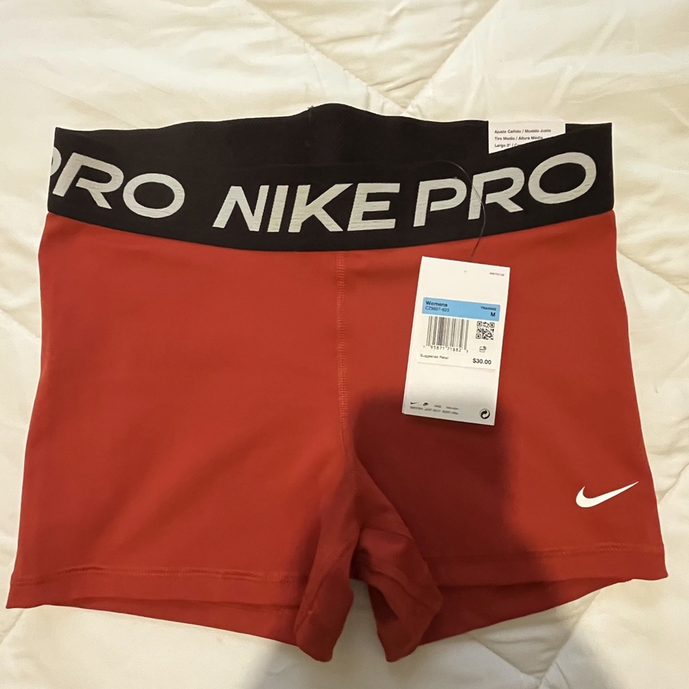 Burnt orange Nike spandex shorts